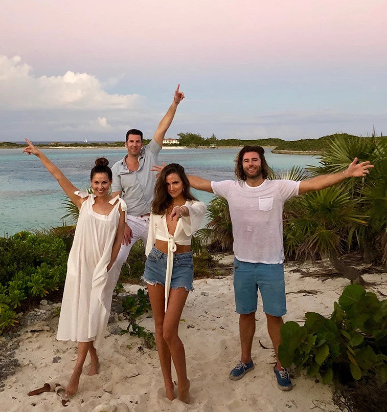 Image of FUNBOY's founders posing at the beach